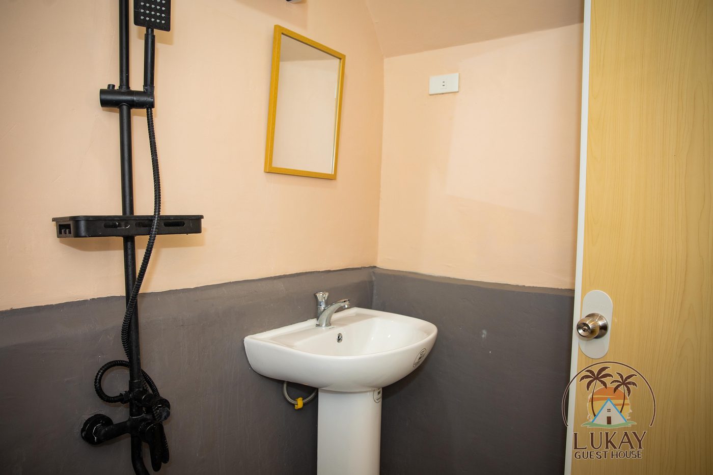 Private bathroom with a shower and pedestal sink